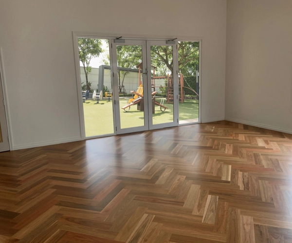 Herringbone parquet flooring in a Dubai room.