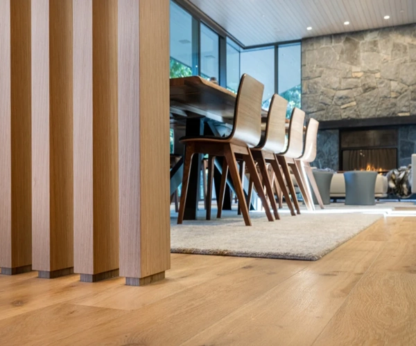 Light-toned wood flooring in a modern Dubai dining room.