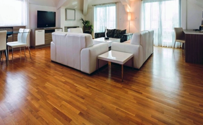 Polished wood flooring in a modern Dubai apartment.